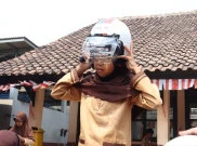 Keselamatan Anak di Jalan Dimulai dari Kebiasaan Gunakan Helm