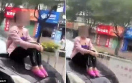 Cegah Suami Pergi, Istri Nekat Duduk di Atas Kap Mobil