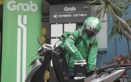 Gandeng Kymco, Grab Hadirkan Stasiun Penukaran Baterai Motor Listrik di Tangerang  